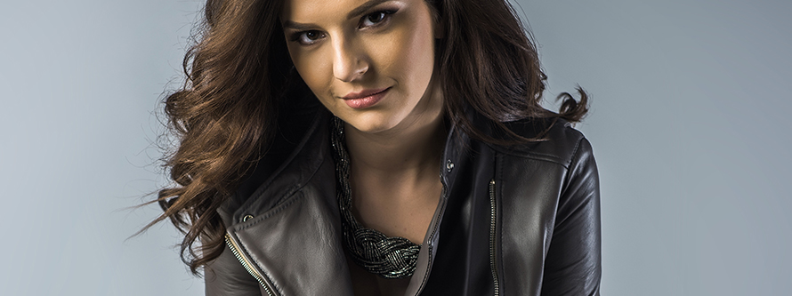 Close-up of a high-quality short leather jacket in a modern black leather