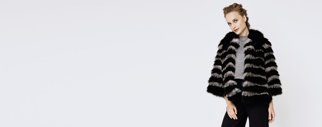 Close-up texture of a quality fur coat showing the dense underfur and soft guard hairs.