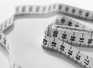 tailor's tape measure to measure