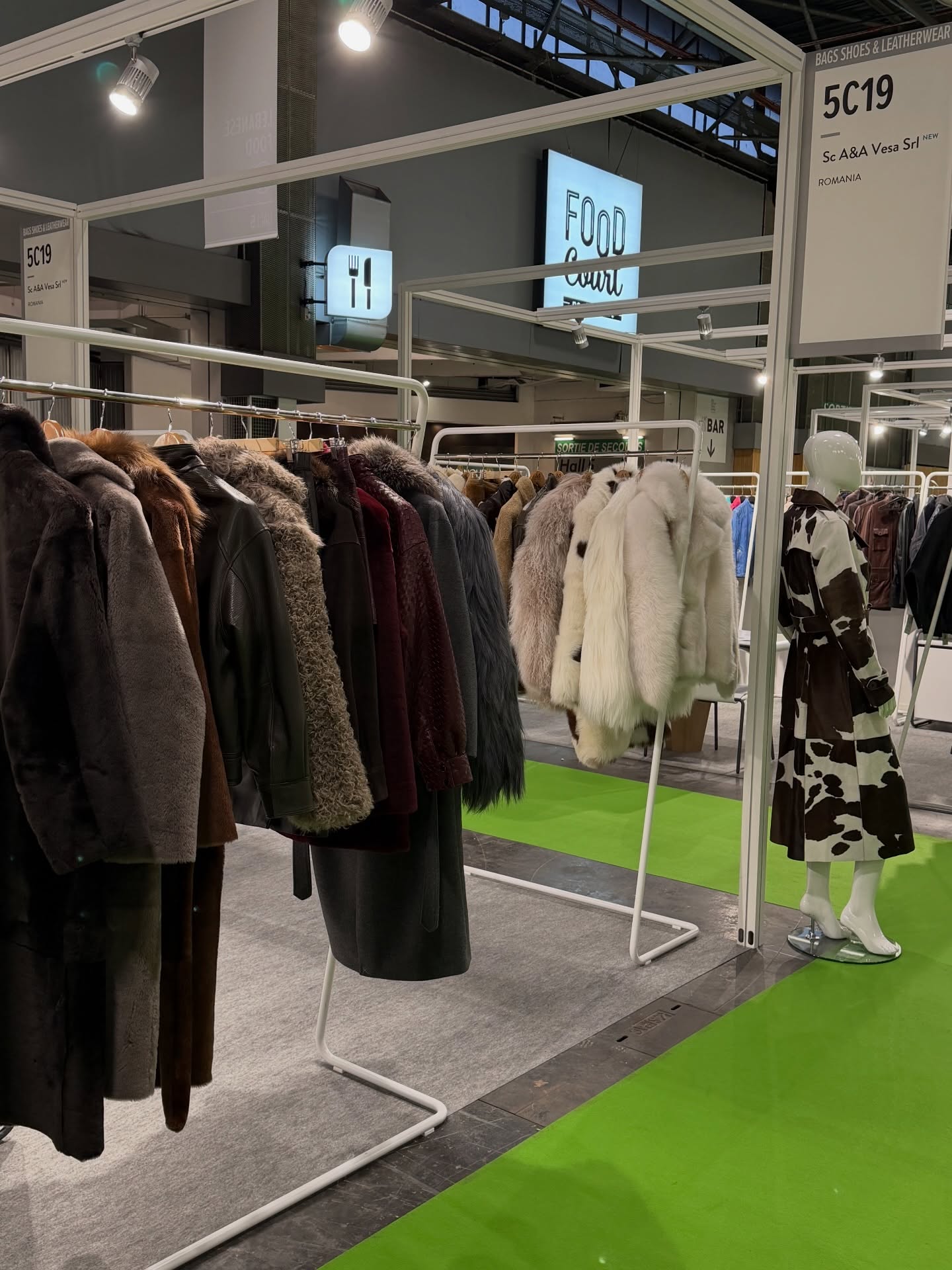 AA Vesa stand at Première Vision Paris trade fair showcasing shearling and leather jackets - A&A Vesa Shearling Factory AA Vesa stand at Première Vision Paris trade fair showcasing shearling and leather jackets